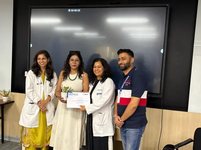 Dr. Shilpi Sharma with Colleagues at a Certificate Presentation